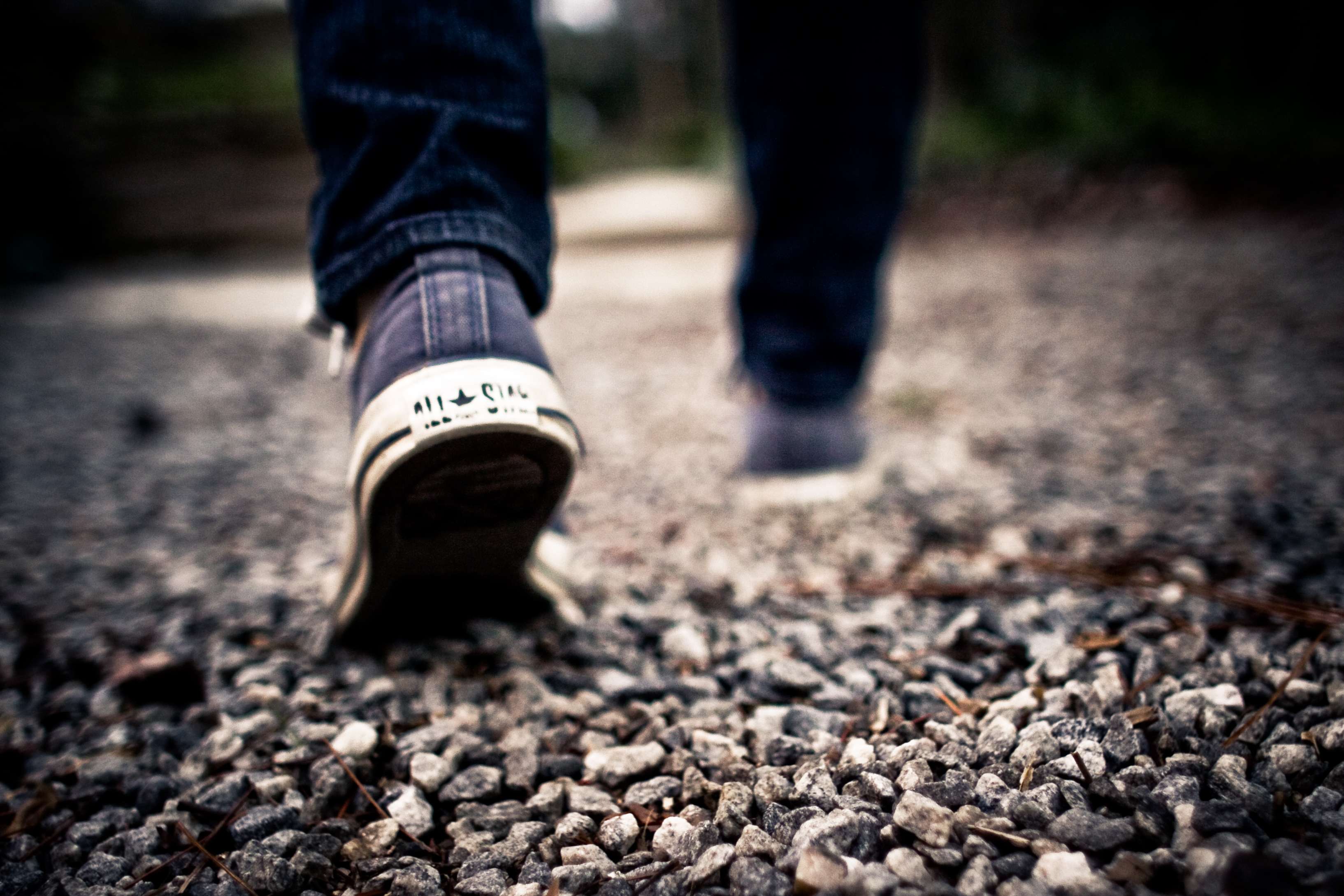 shoes-walking-feet-grey-gravel